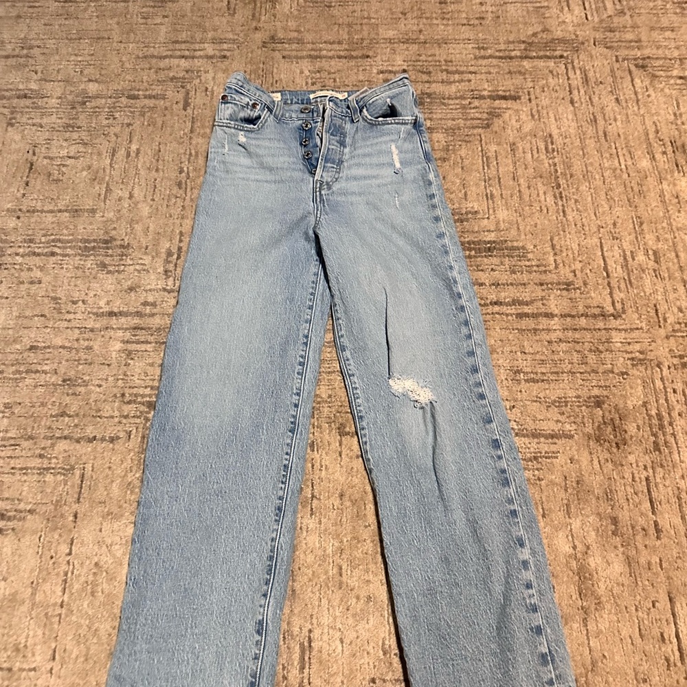 Women's Light Blue Distressed Jeans